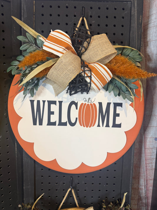 18” Door Hanger with 16” scalloped piece. Welcome with pumpkin.
